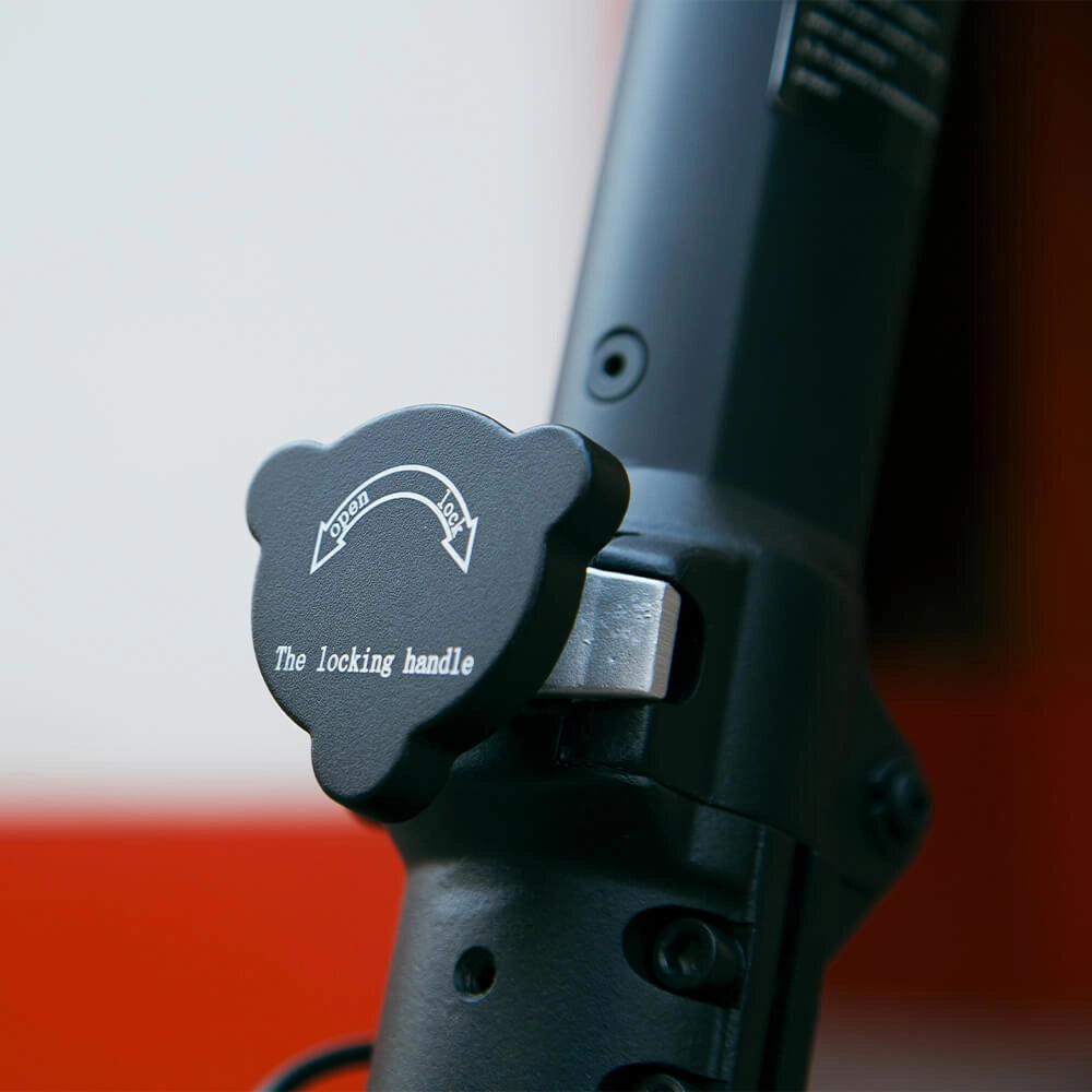 Heavy-duty folding system safety lock cylinder on KuKirin G2 Master stem.