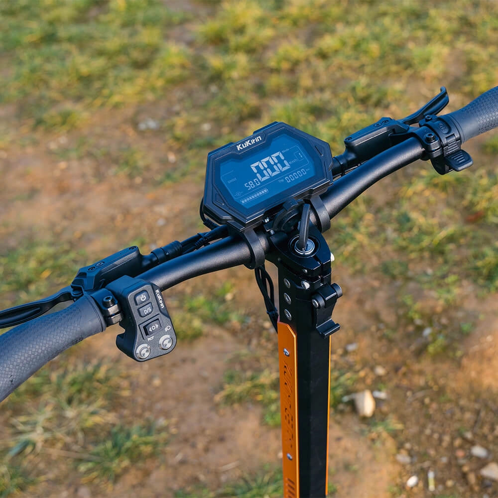 Wide ergonomic handlebar console layout featuring intuitive control switches on the KuKirin G3 Pro
