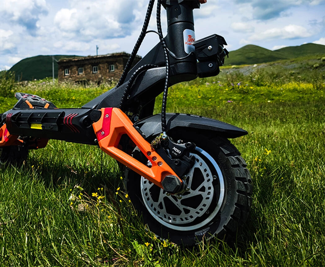 Heavy-duty front four-arm suspension setup on the KuKirin G3 Pro off-road scooter.